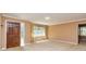 This living room has a window and is carpeted at 166 Muse Rd, Fayetteville, GA 30214
