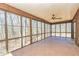 Enjoy nature in this large screened in porch with tile flooring at 166 Muse Rd, Fayetteville, GA 30214