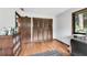 Bedroom with a double door closet, hardwood floors and lots of natural light at 3152 Sycamore Ln, Marietta, GA 30066
