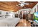Spacious bedroom featuring a vaulted wood ceiling, hardwood floors and walk-in closet at 3152 Sycamore Ln, Marietta, GA 30066