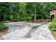 Expansive driveway leads to wooded area at 3152 Sycamore Ln, Marietta, GA 30066