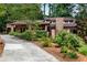 Well-maintained home with stone chimney, beautiful landscaping, and inviting curb appeal at 3152 Sycamore Ln, Marietta, GA 30066