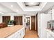 Open kitchen with stainless steel appliances, with long view towards breakfast area at 3152 Sycamore Ln, Marietta, GA 30066