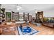 Inviting living room with hardwood floors, a fireplace and large windows at 3152 Sycamore Ln, Marietta, GA 30066