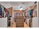 Large walk-in closet featuring built-in shelving, hanging rods, and storage drawers at 3152 Sycamore Ln, Marietta, GA 30066