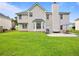 Spacious backyard with patio and outdoor seating area at 5841 Cobalt Dr, Powder Springs, GA 30127
