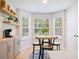 Eat-in kitchen area with bright natural light, barstool seating, and breakfast nook at 5841 Cobalt Dr, Powder Springs, GA 30127