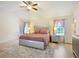 Spacious main bedroom featuring vaulted ceiling, plush carpet, and en-suite bathroom at 5841 Cobalt Dr, Powder Springs, GA 30127