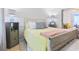 Comfortable main bedroom featuring a cozy bed, bedside tables, and decor at 5841 Cobalt Dr, Powder Springs, GA 30127