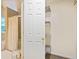 Walk-in closet with ample shelving attached to the bathroom at 5841 Cobalt Dr, Powder Springs, GA 30127