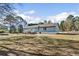 This house has a sprawling backyard, which is perfect for outdoor living and entertaining at 900 Stone Lea Trce, Oxford, GA 30054