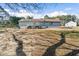 This home features a large grassy backyard with a wooden deck and lots of space to roam at 900 Stone Lea Trce, Oxford, GA 30054