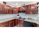 Modern kitchen with granite countertops, updated appliances, and ample storage space at 900 Stone Lea Trce, Oxford, GA 30054