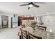 Open concept living area features direct access to kitchen, dining area, and decorative front doors at 900 Stone Lea Trce, Oxford, GA 30054