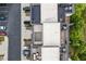 Aerial view of modern townhome roofs with outdoor decks and patios at 2118 Iverson Se Dr, Smyrna, GA 30080