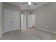 Bedroom with ceiling fan, carpeted floors and closet at 2118 Iverson Se Dr, Smyrna, GA 30080