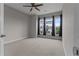 Inviting bedroom with a ceiling fan, carpet, and lots of natural light at 2118 Iverson Se Dr, Smyrna, GA 30080