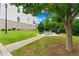 Community fire pit with seating and mature landscaping at 2118 Iverson Se Dr, Smyrna, GA 30080