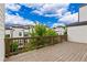 Spacious wooden deck, great for outdoor entertaining, with view of townhome community at 2118 Iverson Se Dr, Smyrna, GA 30080