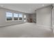 Spacious living room features lots of natural light and access to balcony at 2118 Iverson Se Dr, Smyrna, GA 30080