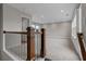 Spacious living room area with wood railing and large window to bring in light at 2118 Iverson Se Dr, Smyrna, GA 30080