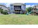 Spacious backyard featuring a playground, slide, and patio at 2875 Daniel Park Run, Dacula, GA 30019