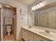 Functional bathroom with double sinks, ample counter space, and storage at 2875 Daniel Park Run, Dacula, GA 30019