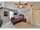 Cozy bedroom with sloped ceiling, neutral carpet, and dormer window at 2875 Daniel Park Run, Dacula, GA 30019