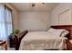 Bedroom featuring a single bed, natural light, and neutral tones, creating a calm and inviting atmosphere at 2875 Daniel Park Run, Dacula, GA 30019