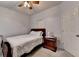 Cozy bedroom with ceiling fan, nightstand and single bed, offering a relaxing personal space at 2875 Daniel Park Run, Dacula, GA 30019
