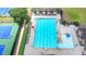 Aerial view of community pool with lap lanes, a shallow area, and ample seating at 2875 Daniel Park Run, Dacula, GA 30019