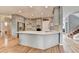 Modern kitchen featuring a large island, stainless steel appliances, and ample cabinet space at 2875 Daniel Park Run, Dacula, GA 30019