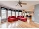 Open floorplan with hardwood floors, a living room, dining area and many windows at 2875 Daniel Park Run, Dacula, GA 30019