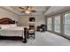 Main bedroom featuring fireplace, and sitting area, offering a luxurious retreat within the home at 2875 Daniel Park Run, Dacula, GA 30019