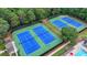 Overhead view of well-maintained community tennis courts, ideal for an active lifestyle at 2875 Daniel Park Run, Dacula, GA 30019