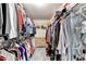 Organized walk-in closet with ample hanging space and shelving at 2875 Daniel Park Run, Dacula, GA 30019