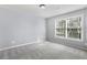 Bedroom with large windows providing plenty of natural light at 1604 Gilstrap Nw Ln, Atlanta, GA 30318