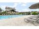 Community pool featuring lounge chairs, umbrellas and clubhouse at 1604 Gilstrap Nw Ln, Atlanta, GA 30318