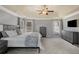 Bright main bedroom features neutral walls, a large bed, and substantial closet space at 1604 Gilstrap Nw Ln, Atlanta, GA 30318