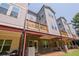 Back exterior of the townhomes with decks at 2247 Pink Hawthorn Dr, Buford, GA 30518