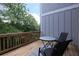 Private deck with outdoor seating and views of the greenery at 2247 Pink Hawthorn Dr, Buford, GA 30518