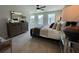 Comfortable bedroom featuring a large bed and three big windows for natural light at 304 Marigold Ln, Woodstock, GA 30188