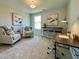 Cozy home office featuring neutral walls, natural light, and desk space for maximum productivity at 304 Marigold Ln, Woodstock, GA 30188