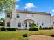 Home's backyard with well-manicured lawn and patio at 3725 Crescent Walk Ln, Suwanee, GA 30024