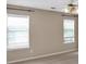 Spacious bedroom with neutral paint and blinds at 3725 Crescent Walk Ln, Suwanee, GA 30024
