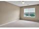 Bedroom with neutral carpet and window with mini-blinds at 3725 Crescent Walk Ln, Suwanee, GA 30024