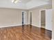 Large main bedroom offers great closet space, ensuite bathroom, and hardwood floors for a luxurious retreat at 3725 Crescent Walk Ln, Suwanee, GA 30024