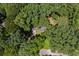 Nestled among tall trees and lush greenery, this property offers privacy and a sense of natural beauty at 3957 Evans Drive Dr, Lithia Springs, GA 30122