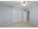 Bedroom with a ceiling fan, neutral carpet and double door closet at 3957 Evans Drive Dr, Lithia Springs, GA 30122