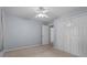 Bedroom with a ceiling fan, neutral carpet and double door closet at 3957 Evans Drive Dr, Lithia Springs, GA 30122